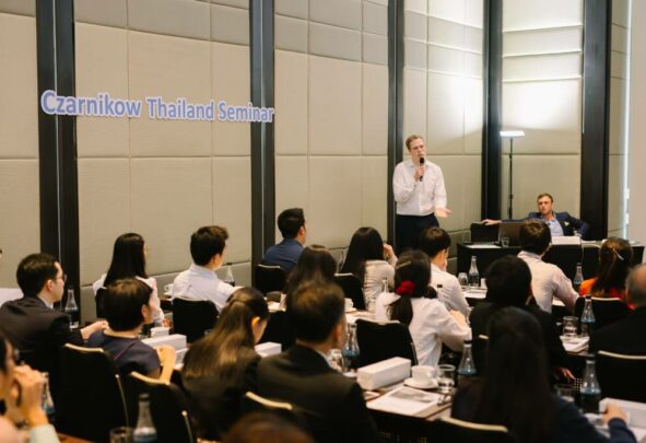 An Analyst presenting to a crowd