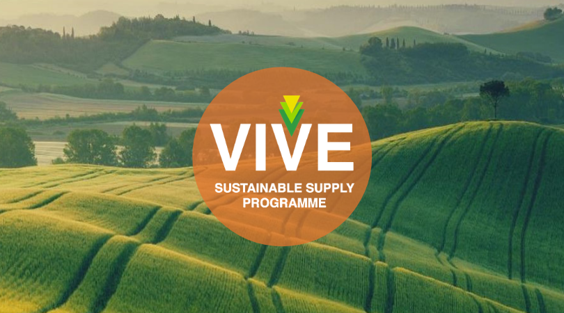 Green fields with VIVE logo over the top