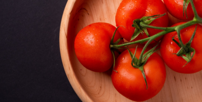 Tomatoes in a wooden bowl