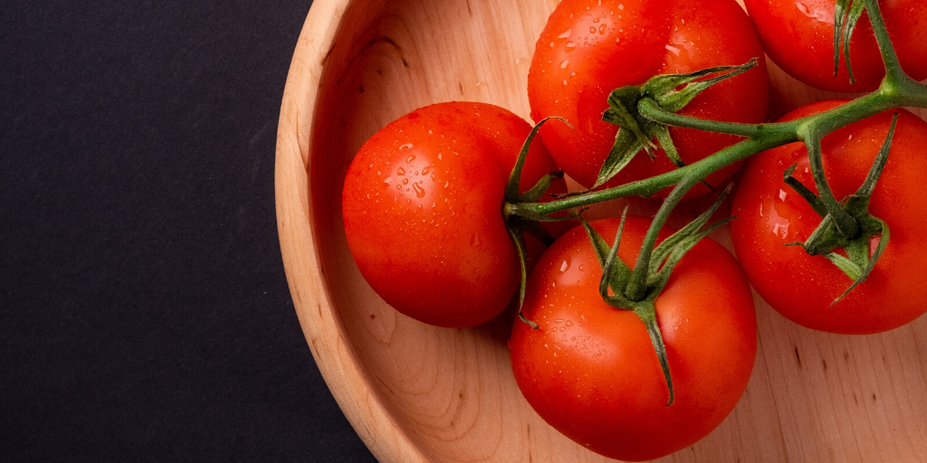 Tomatoes in a wooden bowl