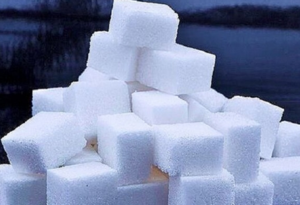 White sugar cubes in a pile