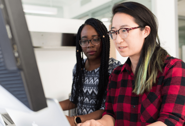 colleagues working at a computer